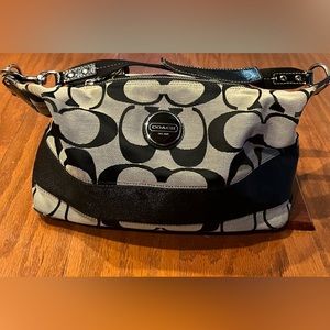 A modern take on an archival 1970s COACH design shoulder bag